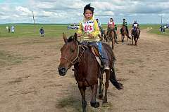 Bayantümen, Dornod, Mongolia, 2011 - Horse race at the Naadam Festival in Choibalsan.