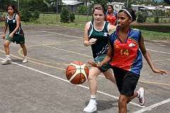 Cairns, Queensland, Australia, 2010 - A Djarragun College student playing basketball at CISSA Sports in Woree.