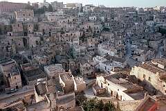 Matera, Basilicata, Italy - Overlooking Sasso Caveoso, a district of the city of Matera, with its “sassi”, stone houses built in a ravine.