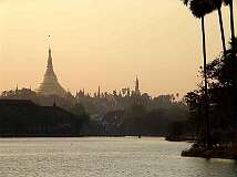 Yangon, Myanmar - The gilded zedi or stupa of Shwedagon Paya, from Kandawgyi Lake.