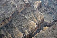 Jebel Shams, Al-Dakhiliyah, Oman - Into Wadi Ghul, a canyon with vertical cliffs of 1000 metres and more, along the road to Jebel Shams.