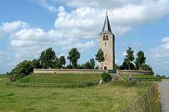 Oosterwierum, Fryslân, Netherlands - Church tower on a “terp” in the Frisian village of Oosterwierum (Easterwierum).